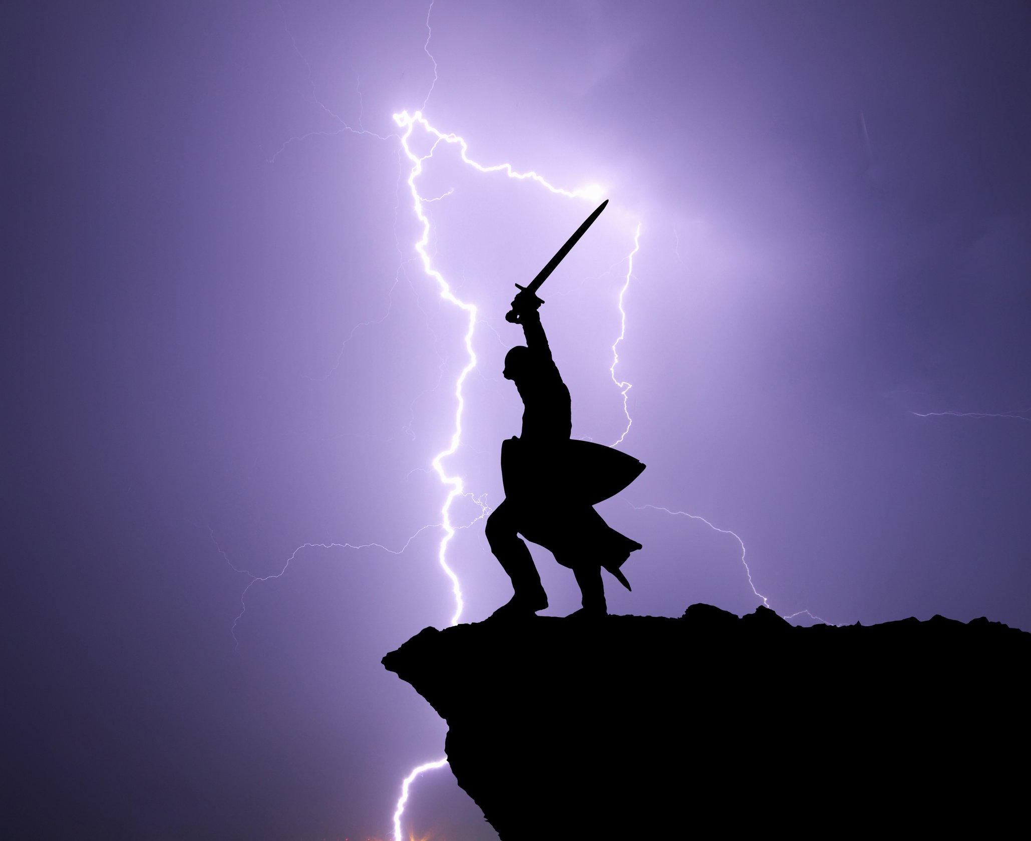 Warrior silhouette and lightning.